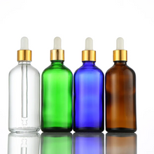 Load image into Gallery viewer, Blue or Green Chromotherapy Colored Glass Water Altar Bottles
