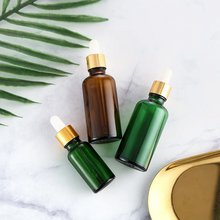 Load image into Gallery viewer, Blue or Green Chromotherapy Colored Glass Water Altar Bottles
