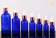 Load image into Gallery viewer, Blue or Green Chromotherapy Colored Glass Water Altar Bottles
