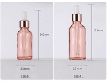 Load image into Gallery viewer, Pink Glass Sacred Water Bottles for Chromotherapy and Water Altars
