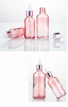Load image into Gallery viewer, Pink Glass Sacred Water Bottles for Chromotherapy and Water Altars
